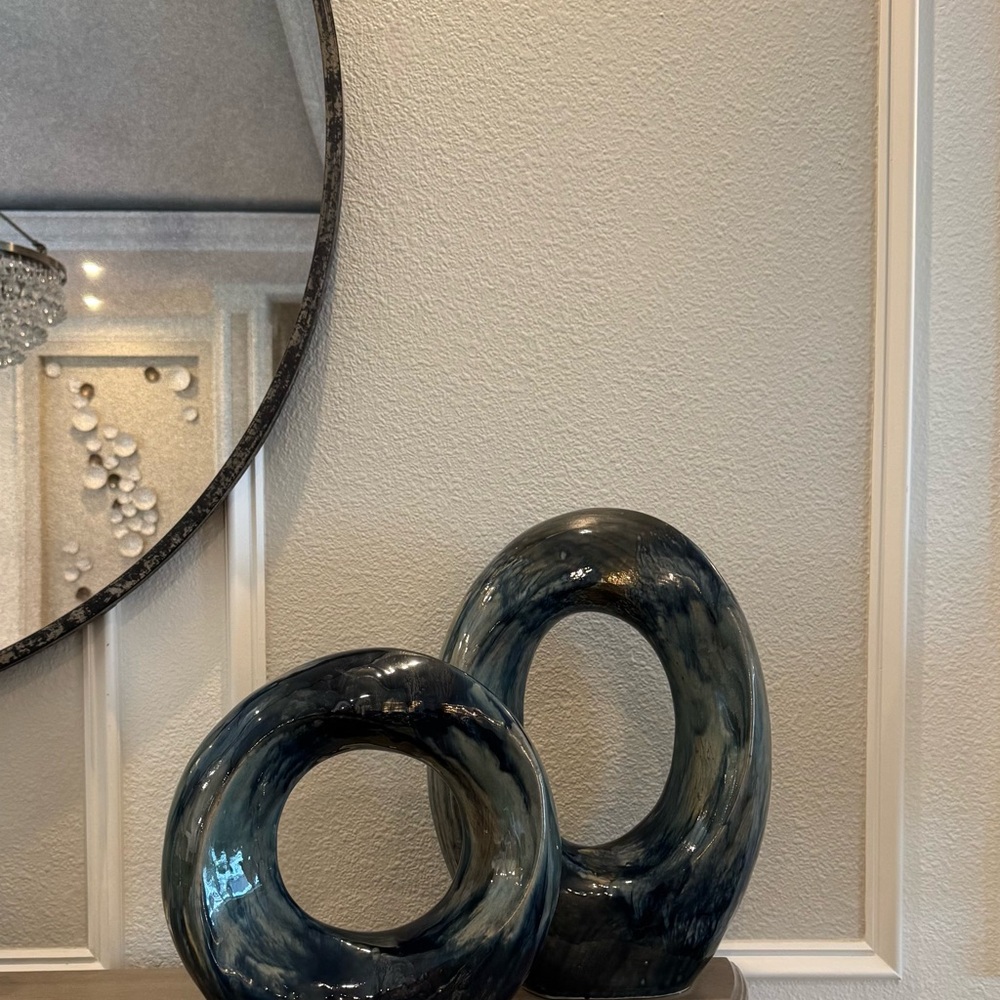 Elegant Blue Glass Ring Sculptures